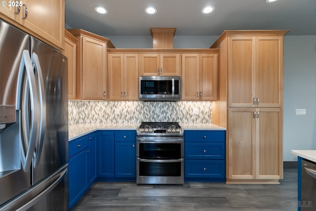 34800 Westboro Way, Saint Helens, OR 97051 - kitchen featuring appliances with stainless steel finishes, light countertops, dark wood-style floors, tasteful backsplash, and recessed lighting
