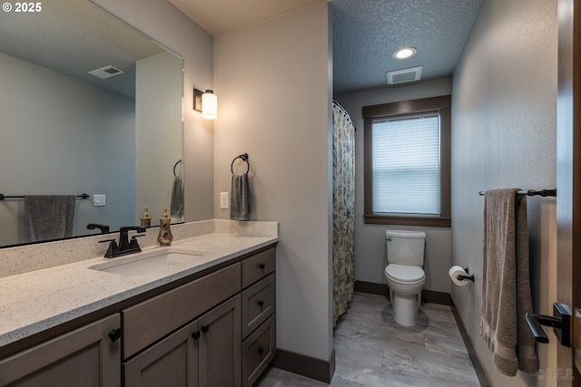 34800 Westboro Way, Saint Helens, OR 97051 - bathroom featuring vanity, baseboards, toilet, and a textured ceiling