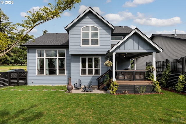 34800 Westboro Way, Saint Helens, OR 97051 - back of property with a shingled roof, a ceiling fan, a wooden deck, a patio, and board and batten siding