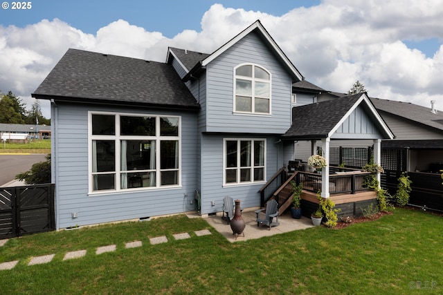 34800 Westboro Way, Saint Helens, OR 97051 - rear view of house featuring a wooden deck, roof with shingles, and a patio