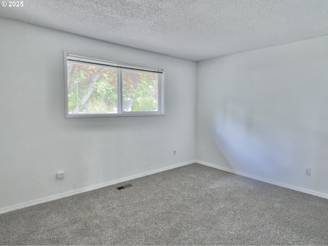 19795 SW Frances St, Beaverton, OR 97003 - carpeted empty room featuring a textured ceiling and baseboards