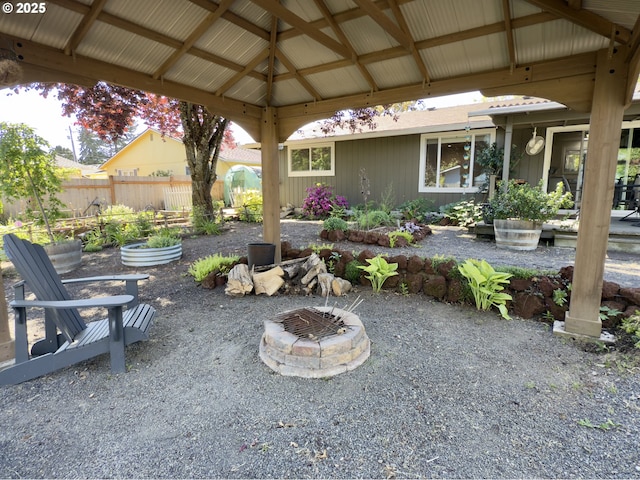 19795 SW Frances St, Beaverton, OR 97003 - view of patio / terrace featuring an outdoor fire pit and fence