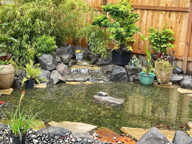 19795 SW Frances St, Beaverton, OR 97003 - view of yard with a garden pond and fence