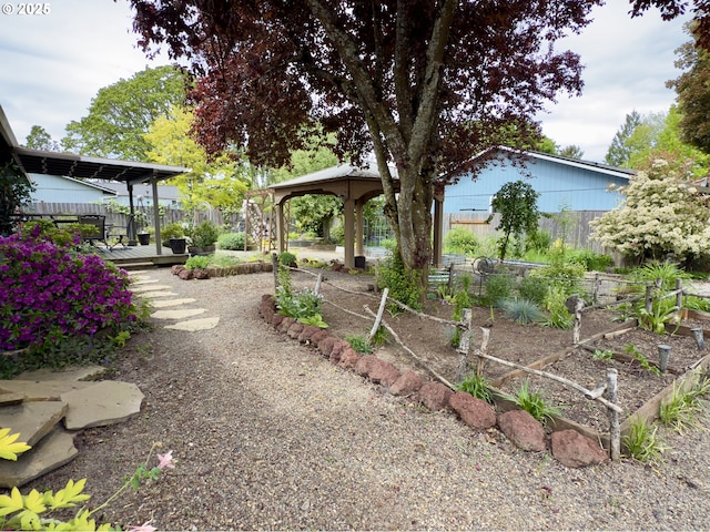 19795 SW Frances St, Beaverton, OR 97003 - view of yard with a gazebo, a garden, fence, and a deck