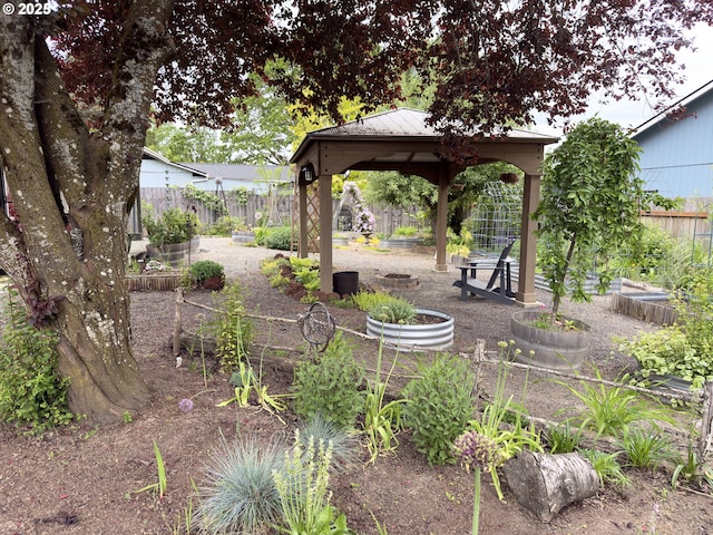 19795 SW Frances St, Beaverton, OR 97003 - view of yard with a gazebo, a vegetable garden, and fence