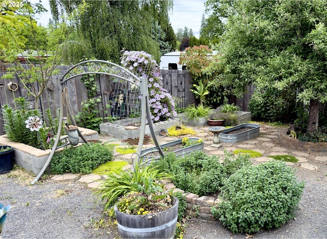 19795 SW Frances St, Beaverton, OR 97003 - view of yard featuring a vegetable garden and fence