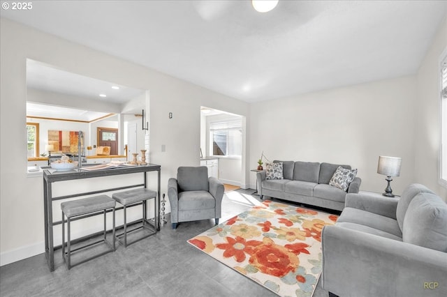 3700 NE Maywood Pl, Portland, OR 97220 - living area featuring baseboards and recessed lighting
