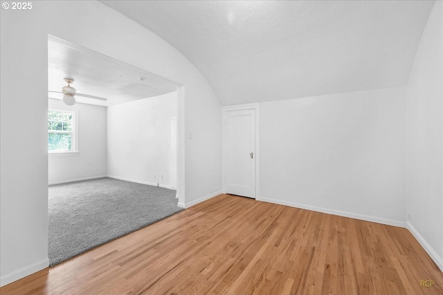 3700 NE Maywood Pl, Portland, OR 97220 - bonus room featuring vaulted ceiling, baseboards, light wood-type flooring, and a ceiling fan