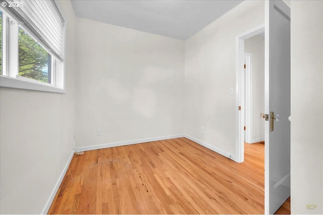 3700 NE Maywood Pl, Portland, OR 97220 - empty room featuring light wood finished floors and baseboards