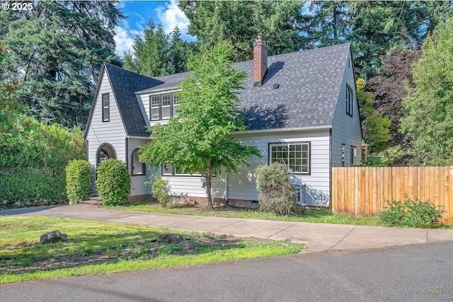 3700 NE Maywood Pl, Portland, OR 97220 - view of front facade featuring a shingled roof and a chimney