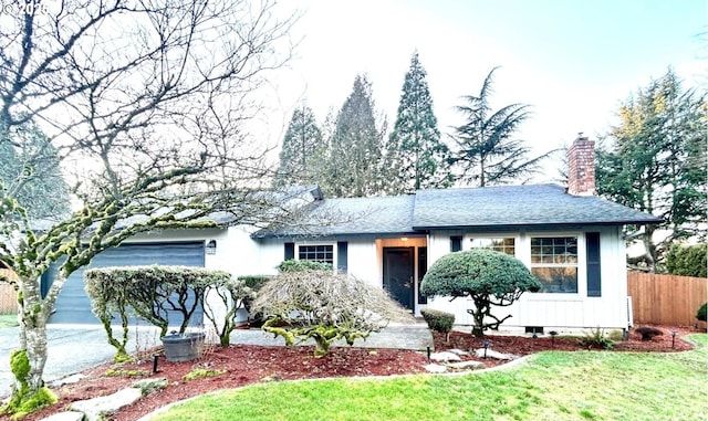 ranch-style home with a front lawn