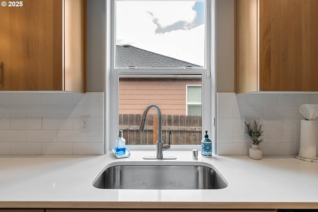 5807 NE 77th Cir, Vancouver, WA 98661 - kitchen view of backsplash, modern cabinets, light countertops, and brown cabinetry