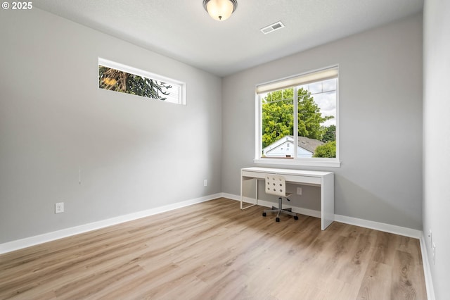 5807 NE 77th Cir, Vancouver, WA 98661 - unfurnished office featuring healthy amount of natural light and wood finished floors