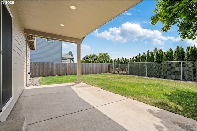 5807 NE 77th Cir, Vancouver, WA 98661 - fenced backyard with a patio
