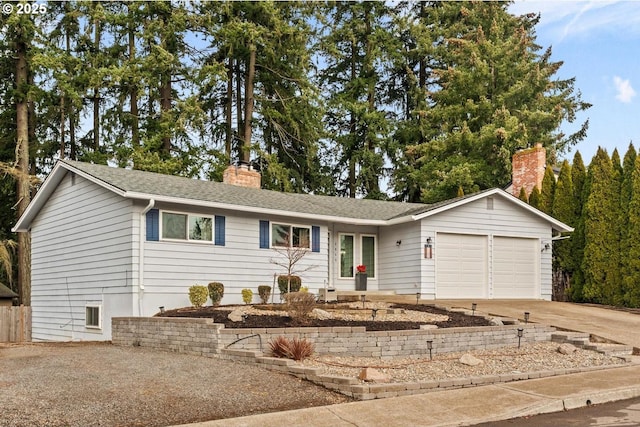 single story home featuring a garage