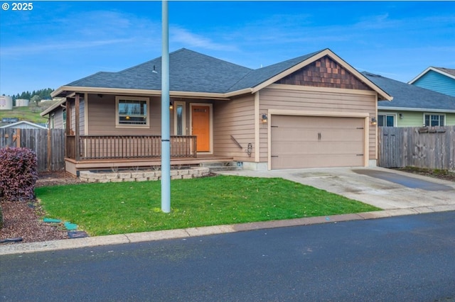 ranch-style home with a porch, a front yard, fence, a garage, and driveway