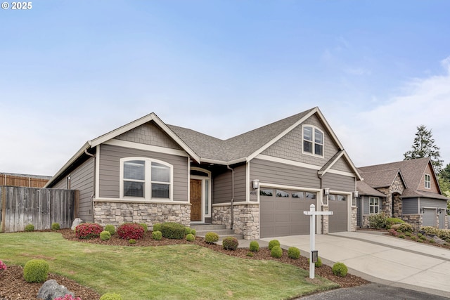 4506 NE 121st St, Vancouver, WA 98686 - craftsman-style home with driveway, stone siding, a garage, and roof with shingles