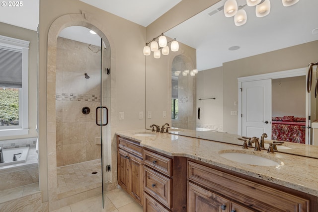 4506 NE 121st St, Vancouver, WA 98686 - bathroom with a stall shower, double vanity, a bath, and tile patterned floors