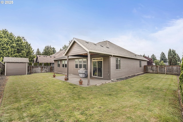 4506 NE 121st St, Vancouver, WA 98686 - rear view of house featuring a patio, an outbuilding, a storage shed, and roof with shingles