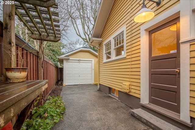 garage with fence