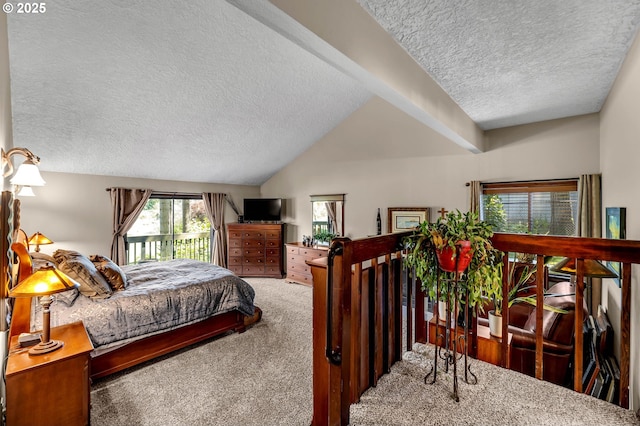 bedroom featuring carpet floors, a textured ceiling, and lofted ceiling