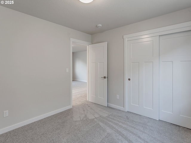 13859 SW Sabrina Ave, Tigard, OR 97140 - unfurnished bedroom featuring carpet, baseboards, and a closet