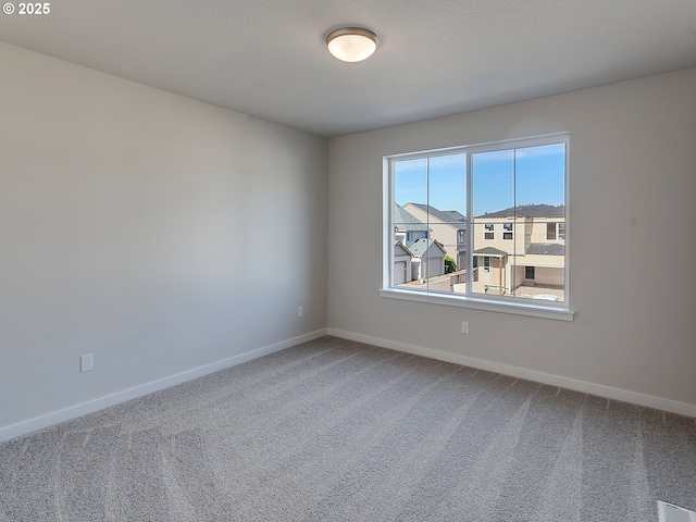 13859 SW Sabrina Ave, Tigard, OR 97140 - carpeted spare room featuring baseboards