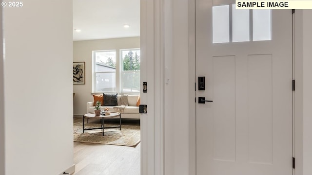 entrance foyer featuring light wood-style flooring