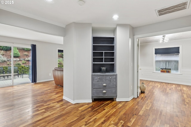 16374 SE Orchard View Ln, Damascus, OR 97089 - unfurnished living room featuring hardwood / wood-style floors, crown molding, and recessed lighting