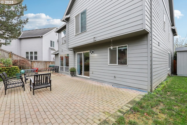 back of house featuring a patio