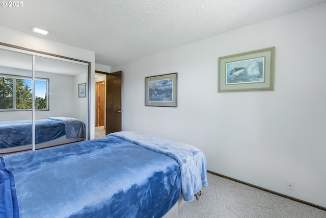 540 Montara Way, Eugene, OR 97405 - bedroom with carpet, a textured ceiling, and a closet