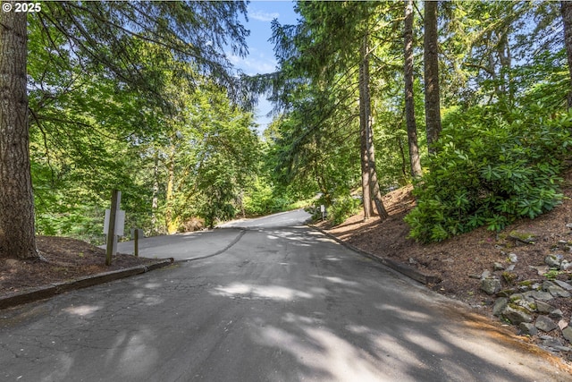 540 Montara Way, Eugene, OR 97405 - view of asphalt road featuring a view of trees