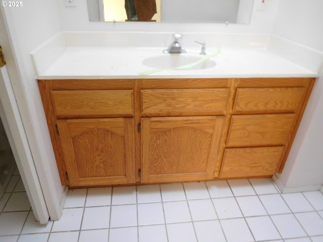 bathroom featuring vanity and tile patterned flooring