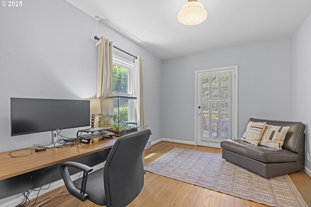 5707 SW Menefee Dr, Portland, OR 97239 - office area with wood finished floors and baseboards