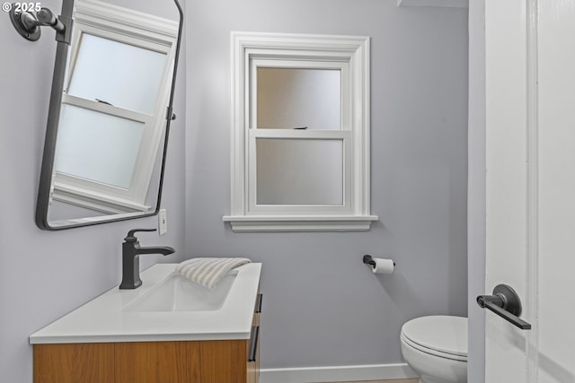 5707 SW Menefee Dr, Portland, OR 97239 - half bathroom featuring baseboards and vanity