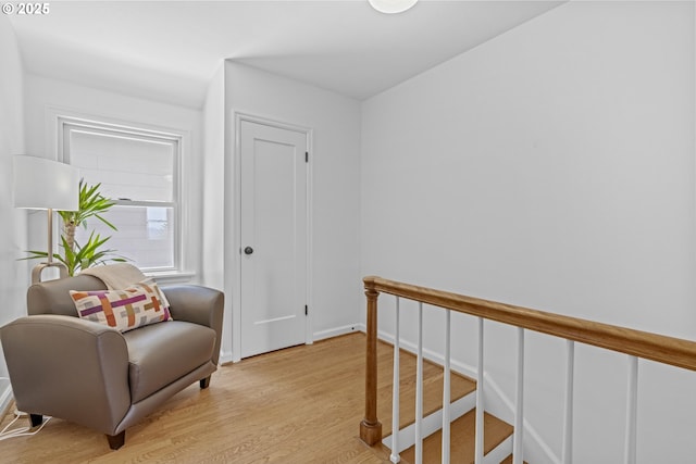 5707 SW Menefee Dr, Portland, OR 97239 - living area featuring light wood finished floors and baseboards