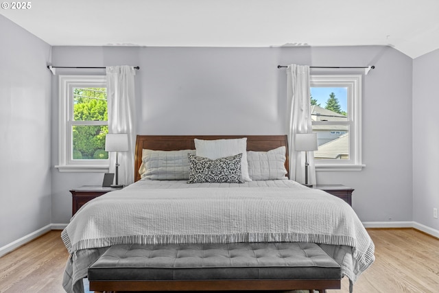 5707 SW Menefee Dr, Portland, OR 97239 - bedroom with wood finished floors