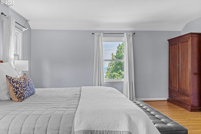 5707 SW Menefee Dr, Portland, OR 97239 - bedroom with light wood finished floors and baseboards
