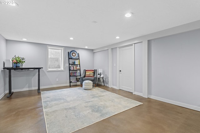5707 SW Menefee Dr, Portland, OR 97239 - sitting room with concrete flooring and recessed lighting