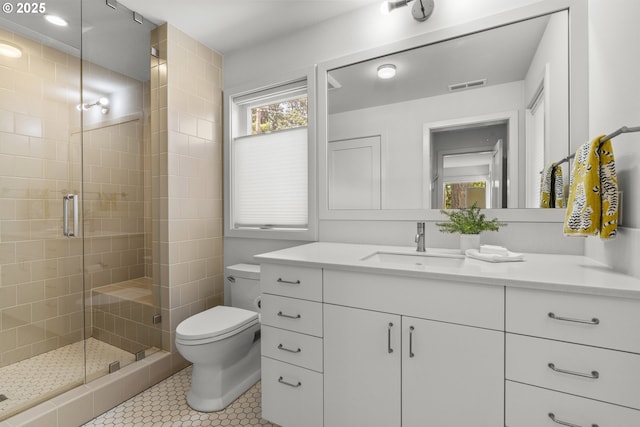 5707 SW Menefee Dr, Portland, OR 97239 - full bath featuring vanity, a shower stall, and tile patterned floors