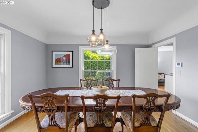 5707 SW Menefee Dr, Portland, OR 97239 - dining area featuring light wood-style flooring
