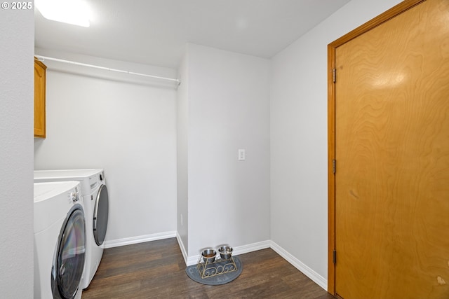 4931 NE Mink Ct, Salem, OR 97305 - washroom featuring independent washer and dryer, dark wood finished floors, and cabinet space