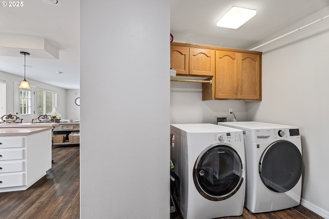 4931 NE Mink Ct, Salem, OR 97305 - laundry area featuring cabinet space, washing machine and clothes dryer, and dark wood-style floors