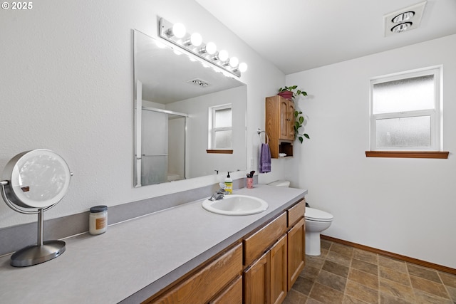 4931 NE Mink Ct, Salem, OR 97305 - full bath with plenty of natural light, vanity, and a shower with door