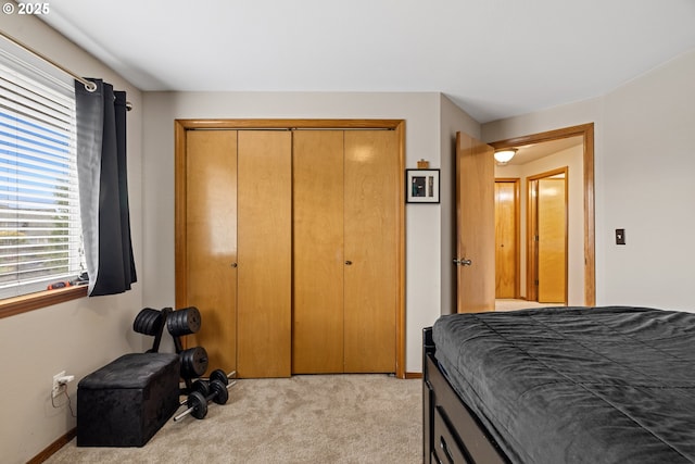4931 NE Mink Ct, Salem, OR 97305 - bedroom with a closet and light carpet