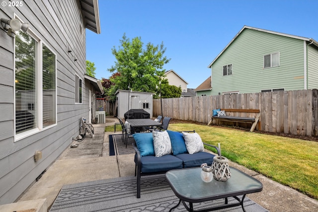 4931 NE Mink Ct, Salem, OR 97305 - fenced backyard with a shed, a patio area, outdoor lounge area, and outdoor dining area