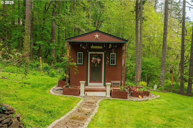 view of outdoor structure with an outdoor structure and a forest view