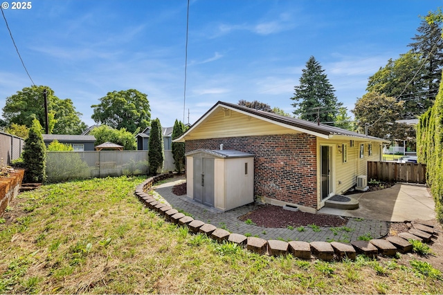 2117 Kauffman Ave, Vancouver, WA 98660 - rear view of property with brick siding and a patio