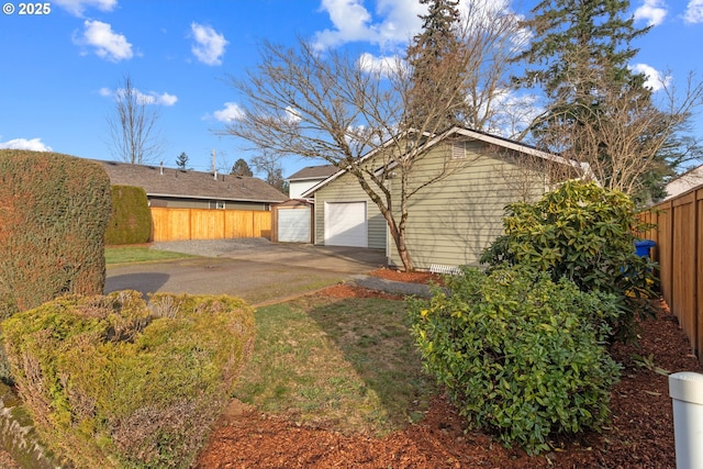 view of side of property featuring a garage