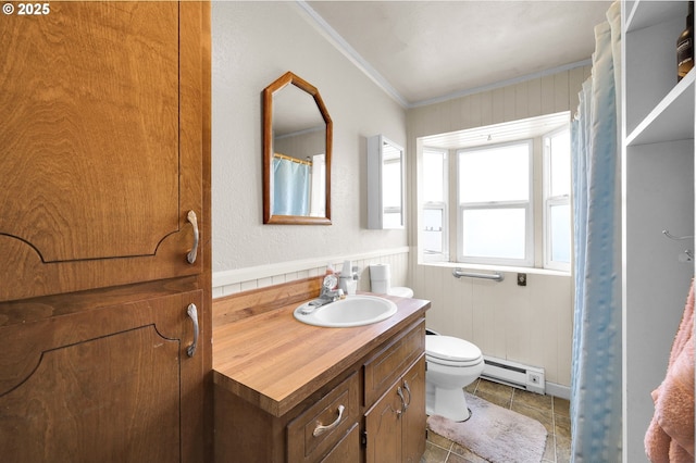 695 32nd St, Springfield, OR 97478 - bathroom featuring baseboard heating, ornamental molding, vanity, and tile patterned floors
